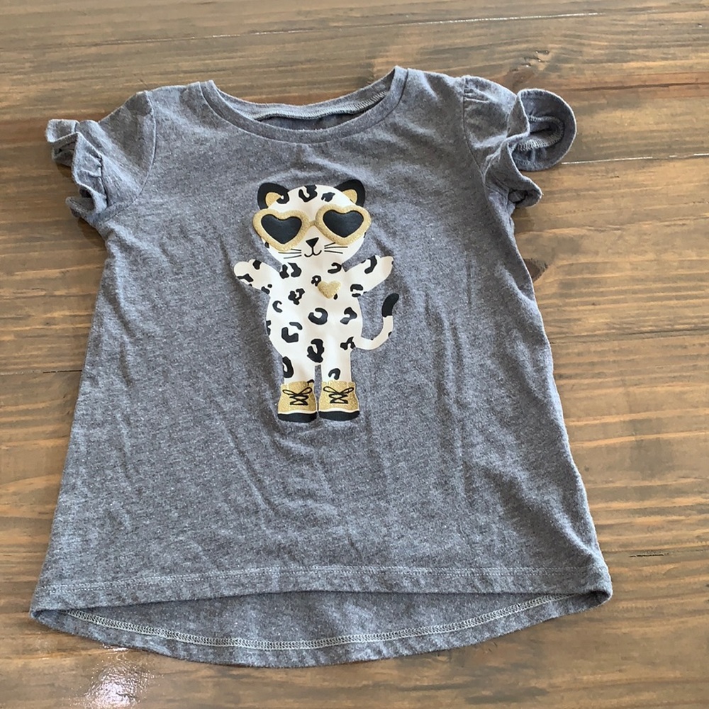 Carter’s ruffled sleeved shirt. Size 4t.
